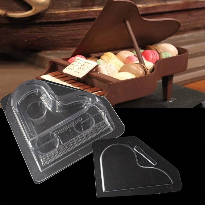 https://www.bakeshake.co.in/image/cache/catalog/products/piano%20polycarbonate%20chocolate%20mould%201-800x800.jpeg